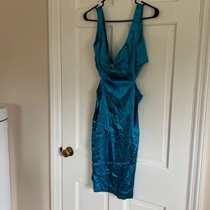 Size 7/8 blue dress with side openings.